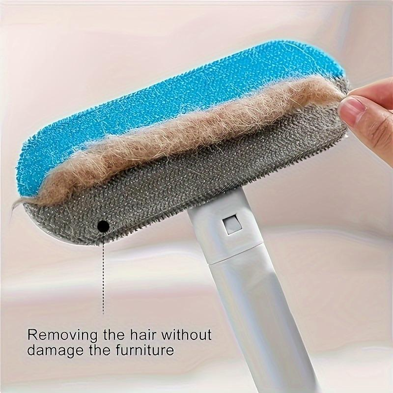 Pet hair removal brush with a hand holding it, showing its effectiveness on furniture.